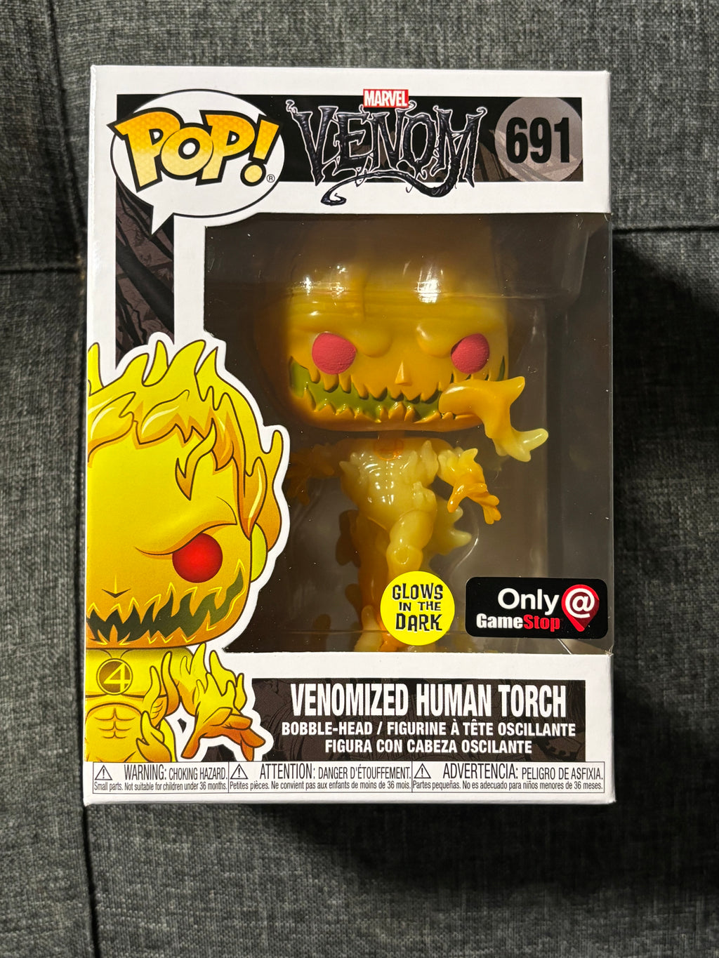 Venomized Human Torch #691 (GITD) (mystery box)