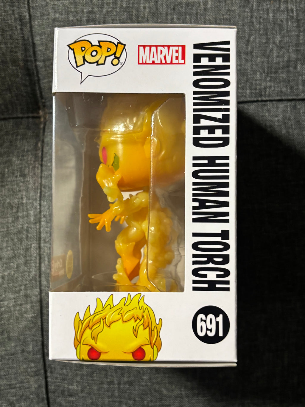 Venomized Human Torch #691 (GITD) (mystery box)