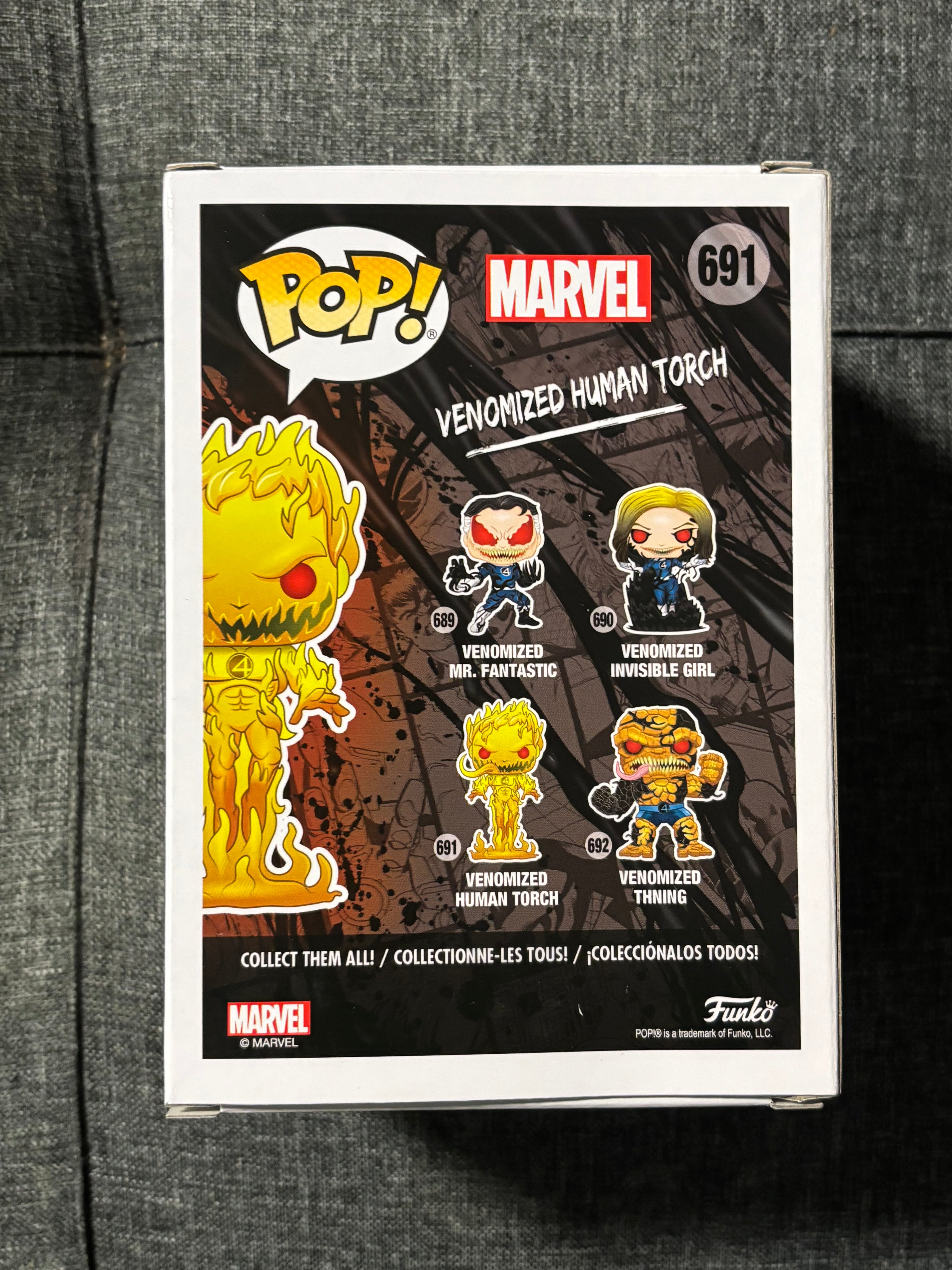 Venomized Human Torch #691 (GITD) (mystery box)