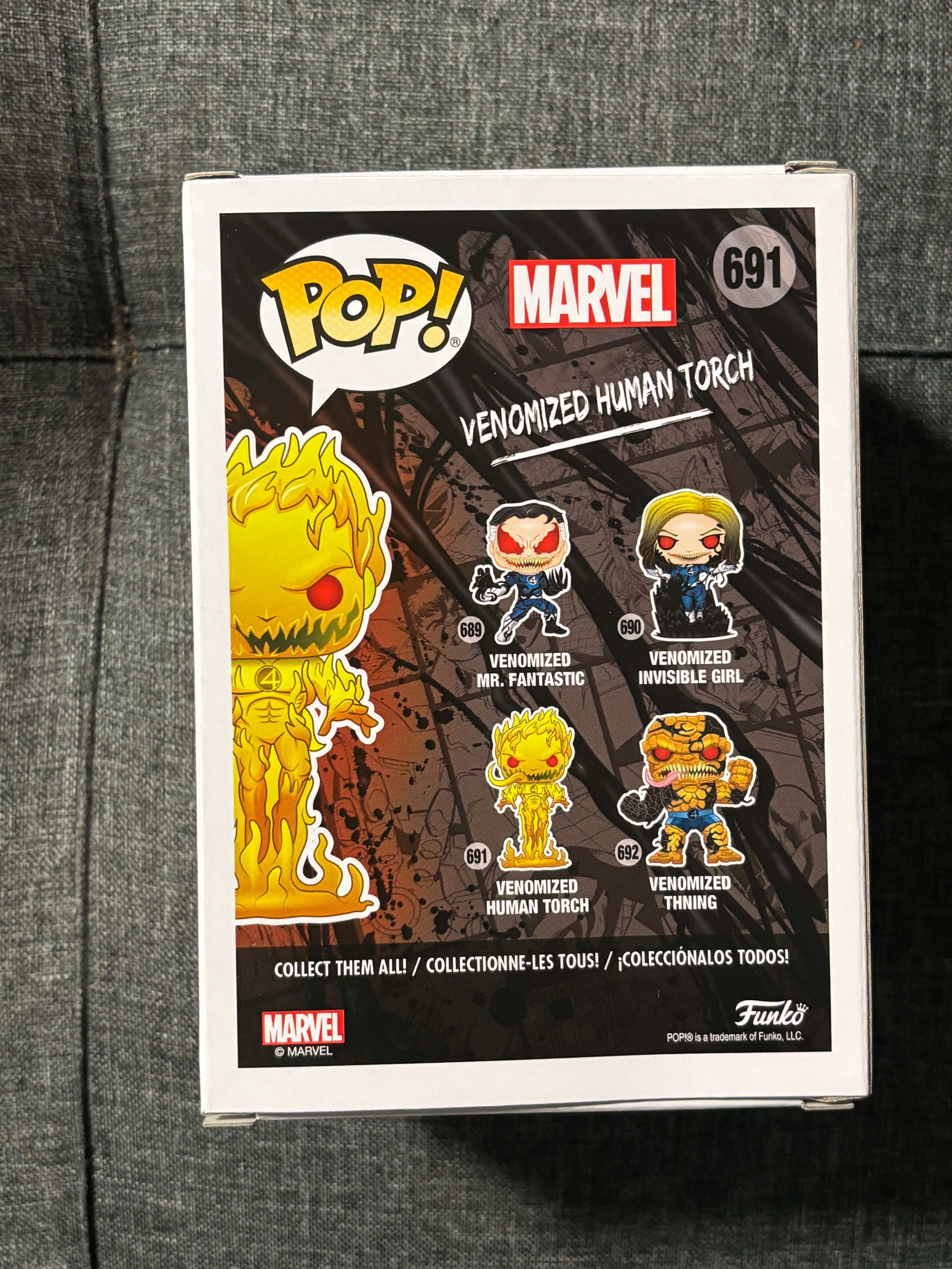 Venomized Human Torch #691 (GITD) (mystery box)