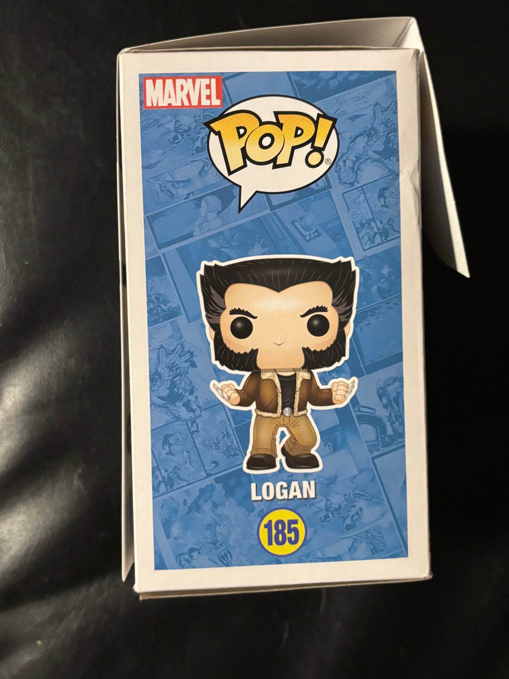 Logan (Wolverine) (checks photos box n paint on face).