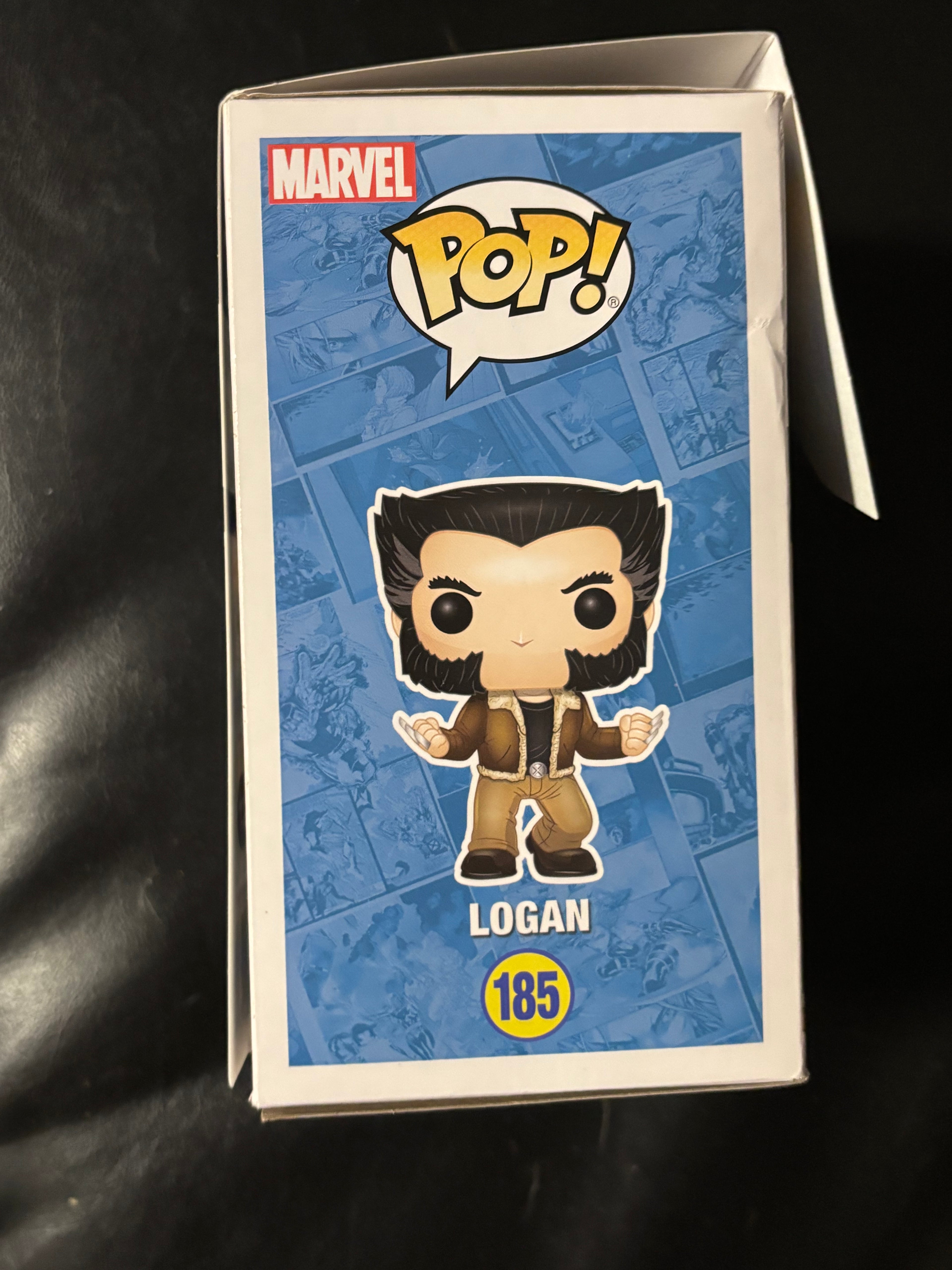 Logan (Wolverine) (checks photos box n paint on face).
